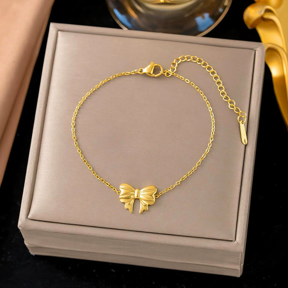 Wholesale Women's Geometric Titanium Steel Necklace And Bracelet Set With 18K Gold Plated O Word Chain And Ribbon Bow Pendant