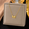 Wholesale Women's Geometric Titanium Steel Necklace And Bracelet Set With 18K Gold Plated O Word Chain And Ribbon Bow Pendant