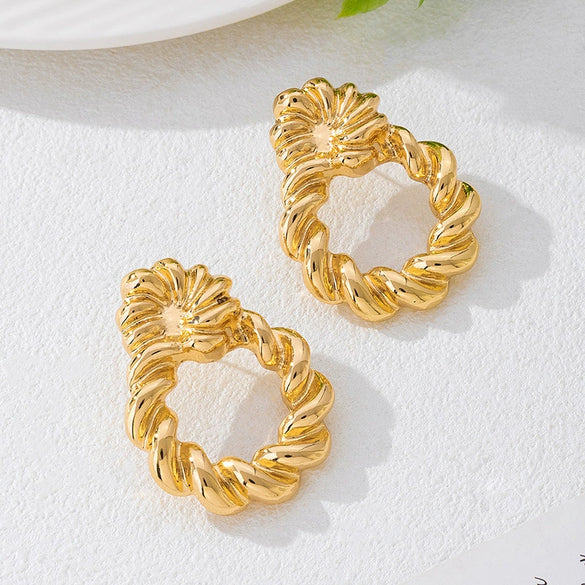 Wholesale Women's Geometric Twist Pattern Circle Alloy Earrings With Stainless Steel Ear Needles Electroplated
