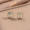 Wholesale Women's Geometric Zircon Earrings In Copper With Gold Plating And A Luxurious Style