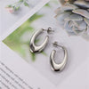Wholesale Women's Gold Inlaid Ushaped Titanium Steel Hollow Earrings
