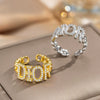 Wholesale Women's Gold Plated Copper Letter Ring With Diamond Encrusted And Hollow Design