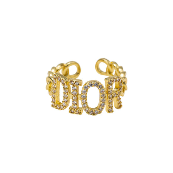 Wholesale Women's Gold Plated Copper Letter Ring With Diamond Encrusted And Hollow Design