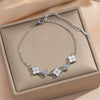 Wholesale Women's Gold Plated Geometric Titanium Steel And Copper Splicing Bracelet With Flower And Leaf Patterns