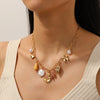Wholesale Women's Goldplated Stainless Steel Floral Geometric Pendant Necklace With Flat Cross Chain