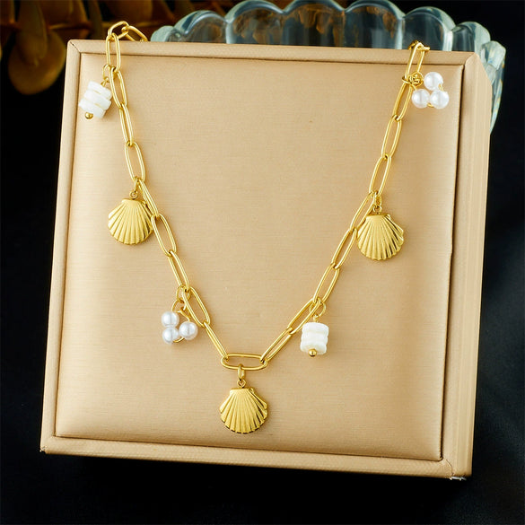 Wholesale Women's Goldplated Stainless Steel Heart Shape And Flower Pattern Hollow Pendant Necklace With Cross Chain