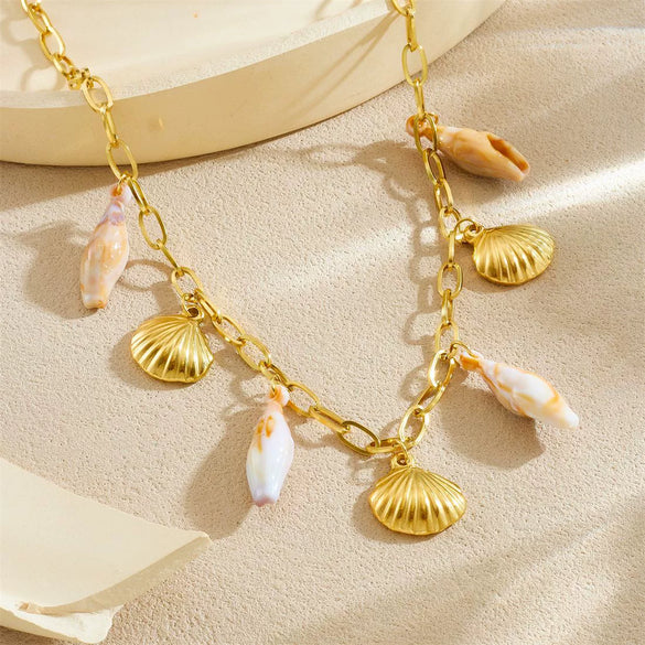 Wholesale Women's Goldplated Stainless Steel Heart Shape And Flower Pattern Hollow Pendant Necklace With Cross Chain