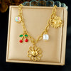 Wholesale Women's Goldplated Stainless Steel Heart Shape And Flower Pattern Hollow Pendant Necklace With Cross Chain