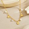 Wholesale Women's Goldplated Stainless Steel Heart Shape And Flower Pattern Hollow Pendant Necklace With Cross Chain