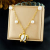 Wholesale Women's Goldplated Stainless Steel Heart Shape And Flower Pattern Hollow Pendant Necklace With Cross Chain