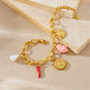 Wholesale Women's Goldplated Stainless Steel Heartshaped Plant Flower Pendant Jewelry Bracelet