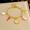 Wholesale Women's Goldplated Stainless Steel Heartshaped Plant Flower Pendant Jewelry Bracelet