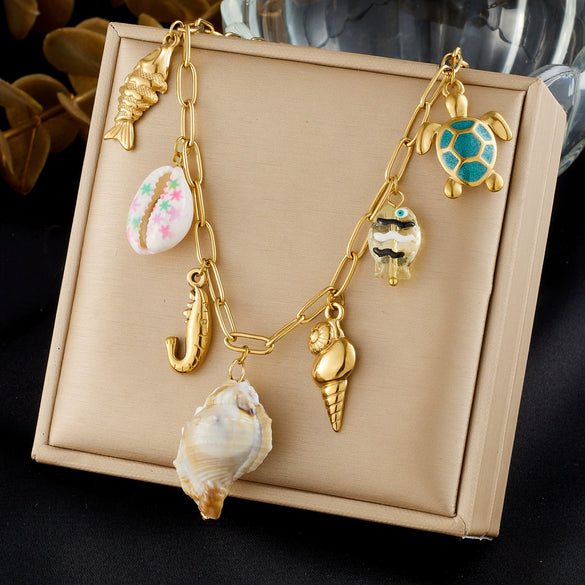 Wholesale Women's Goldplated Stainless Steel Marine Life Conch And Small Fish Pendant Necklace With Flat Cross Chain