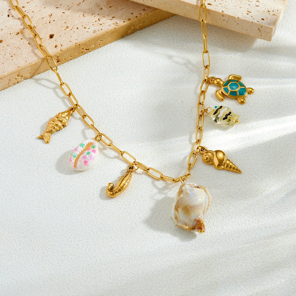 Wholesale Women's Goldplated Stainless Steel Marine Life Conch And Small Fish Pendant Necklace With Flat Cross Chain