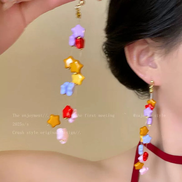 Wholesale Women's Handmade Plastic And Resin Flowershaped Tassel Earrings Little Fresh Style