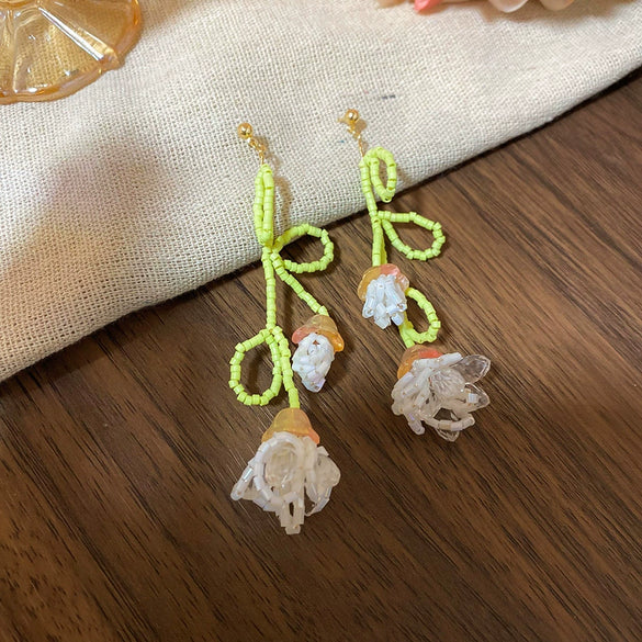 Wholesale Women's Handmade Plastic And Resin Flowershaped Tassel Earrings Little Fresh Style
