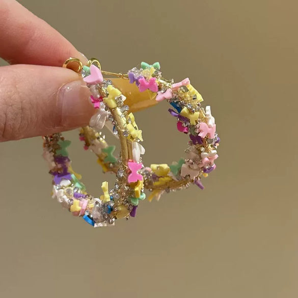 Wholesale Women's Handmade Plastic And Resin Flowershaped Tassel Earrings Little Fresh Style