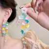 Wholesale Women's Handmade Plastic And Resin Flowershaped Tassel Earrings Little Fresh Style