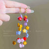 Wholesale Women's Handmade Plastic And Resin Flowershaped Tassel Earrings Little Fresh Style