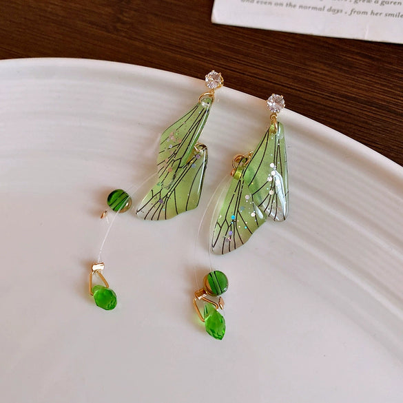 Wholesale Women's Handmade Plastic And Resin Flowershaped Tassel Earrings Little Fresh Style