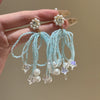 Wholesale Women's Handmade Plastic And Resin Flowershaped Tassel Earrings Little Fresh Style