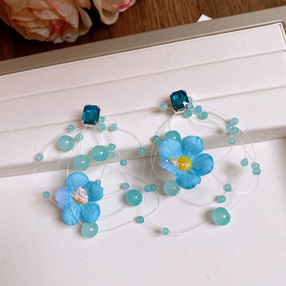 Wholesale Women's Handmade Plastic And Resin Flowershaped Tassel Earrings Little Fresh Style