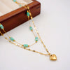 Wholesale Women's Handmade Titanium Steel Heart Pattern Retro Imitation Turquoise Pendant Clavicle Chain
