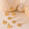 Wholesale Women's Heart Winding Pendant Hollow Titanium Steel Necklace And Earrings With Golden Diamond Bow Light Luxury Style Electroplating Treatment