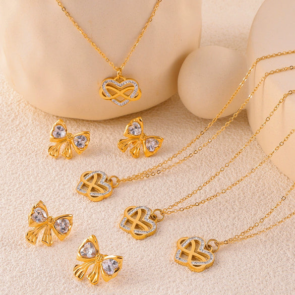 Wholesale Women's Heart Winding Pendant Hollow Titanium Steel Necklace And Earrings With Golden Diamond Bow Light Luxury Style Electroplating Treatment