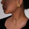 Wholesale Women's Heart Winding Pendant Hollow Titanium Steel Necklace And Earrings With Golden Diamond Bow Light Luxury Style Electroplating Treatment