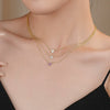 Wholesale Women's Heartshaped 925 Sterling Silver Zircon Inlaid Pendant Necklace With Cross Chain