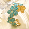 Wholesale Women's Highend Geometric Open Stainless Steel Oildripping Flower Bracelet