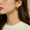 Wholesale Women's Hiphop Skull And Heart Hollowout Goldplated Stainless Steel Earrings