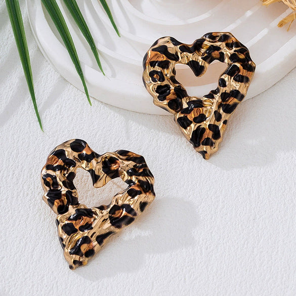 Wholesale Women's Hollow Heart And Flower Pattern Leopard Print Alloy Electroplated Earrings Accessories