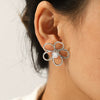 Wholesale Women's Hollow Stainless Steel Geometric Flower Zircon Inlaid Earrings