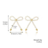 Wholesale Women's Imitation Pearl Beaded Bow Earrings Simple Style