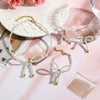 Wholesale Women's Imitation Pearl Beaded Bow Earrings Simple Style