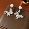 Wholesale Women's Imitation Pearl Geometric Style Electroplated Earrings