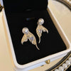 Wholesale Women's Imitation Pearl Geometric Style Electroplated Earrings