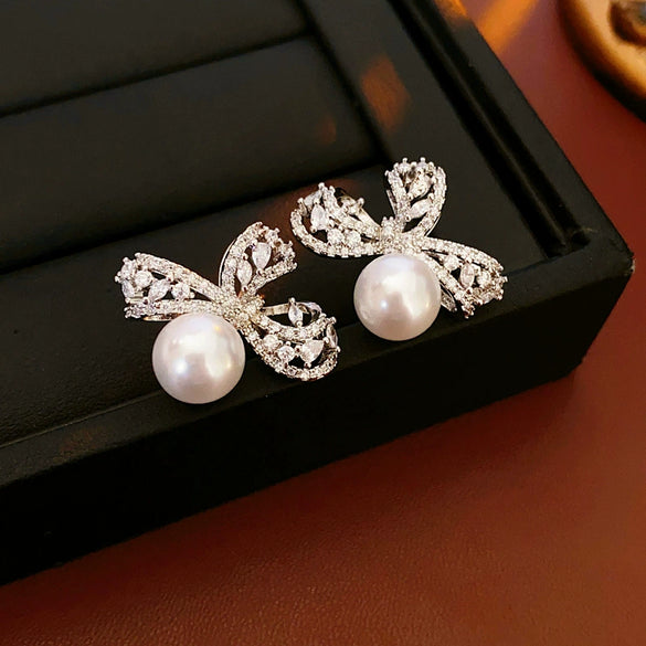 Wholesale Women's Imitation Pearl Geometric Style Electroplated Earrings