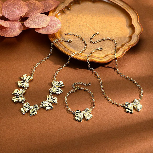 Wholesale Women's Jewelry Alloy Imitation Pearl Bow Geometric Necklace With Electroplating