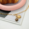 Wholesale Women's Jewelry Stainless Steel Electroplated Necklace With Tiger Eye Stone Heart Shape And Geometric Pattern