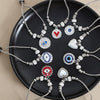 Wholesale Women's Jewelry 316L Stainless Steel Exaggerated Eyes Pendant Bracelet With Geometric Pattern And Dripping Oil Design