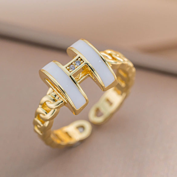 Wholesale Women's Jewelry Trendy Black H Ring Hollow Titanium Steel Jewelry With Diamond Design And Vacuum Furnace Electroplating