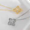 Wholesale Women's 18K Goldplated Copper Geometric Fourleaf Clover Flower Zircon Inlaid Hollow Necklace With O Word Chain