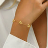 Wholesale Women's 18K Real Gold Plated Heartshaped Pendant Necklace With Tassel In Sporty Geometric Style