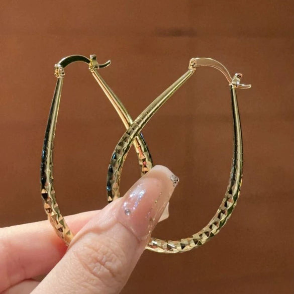 Wholesale Women's Light Luxury Alloy Drop Shape Electroplated Earrings
