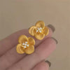 Wholesale Women's Light Luxury Copper Electroplated Flower Shaped Earrings With Silver Needle Sequins