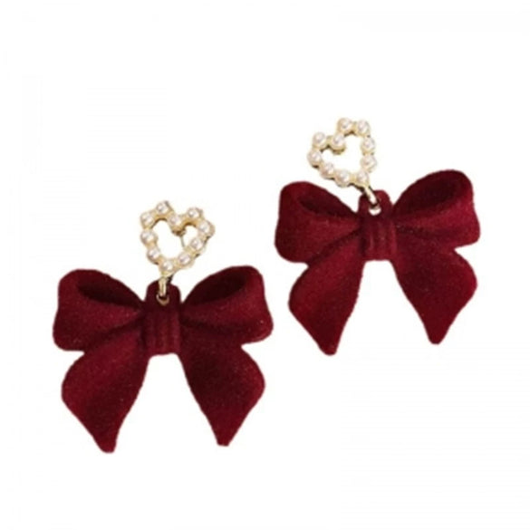 Wholesale Women's Light Luxury Flocking Bow And Heart Zinc Alloy Earrings With Electroplating Treatment