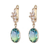 Wholesale Women's Light Luxury Geometric Copper Earrings With Oval Gem And Zircon Inlay And Electroplating Treatment